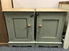 A pair of painted pine single door cupboards (2)