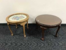 A circular oak tapestry topped coffee table on cabriole legs together with circular coffee table on