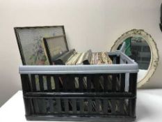 A box of lps, cream and gilt mirror, two wool panels,