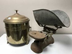 An antique set of weighing scales together with a brass coal receiver containing coal