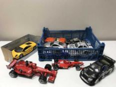Two crates of large scale die cast sports cars,
