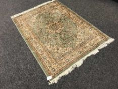 A Persian Kashan rug 190 cm x 140 cm