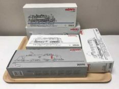 Five Marklin engines numbers 36850, 33071, 34402, 36848, 30345, HO scale all parts boxed.