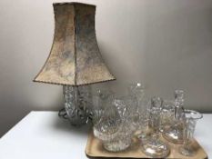 A tray containing assorted lead crystal including table lamp, basket, fruit bowl, candlesticks,