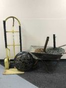 A heavy duty sack barrow together with a wheel barrow and three cast metal parasol stands