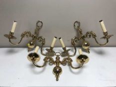 Two boxes of eight decorative twin arm wall lights