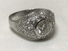 A white gold diamond bombay style ring, the central stone approximately 1ct, size M.