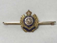 A 9ct gold and enamel Royal Engineer's bar brooch with emblem, in fitted tooled leather box, 4.