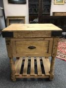 A reclaimed pine butcher's block fitted with a drawer