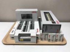 A Marklin locomotive engine 36140 together with 42041 carriages and 39501 locomotive engine with