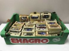 A box of Days Gone By die cast vehicles,