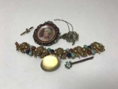 A collection of costume and vintage jewellery, Egyptian revival bracelet etc.