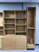 A set of contemporary shelves with cupboards beneath together with pine shelves