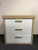 A contemporary three drawer baby changing chest