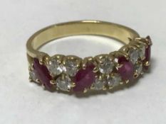 An 18ct gold diamond and ruby ring,