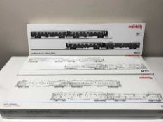 Three Marklin passenger car sets 4229, 42751, 42757, HO scale all parts boxed.