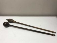 Two tribal throwing clubs