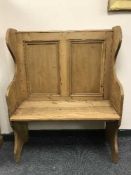 A reclaimed pine hall seat