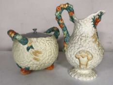 A Clarice Cliff Newport pottery jug and twin handled pot