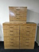 A pair of melamine six drawer chests and bedside chests