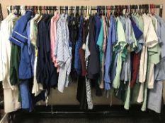 A full rail of nurses outfits, shirts,