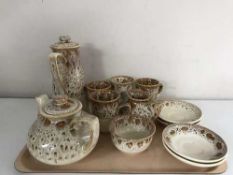A tray of twelve piece 1970's pottery tea service