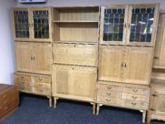 A blonde oak eleven section modular unit