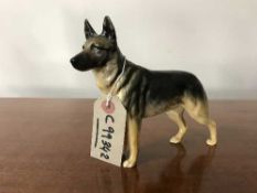 A Beswick china figure : Alsatian 