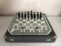 A boxed Swarovski crystal chess set
