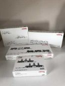 Four Marklin assorted train car sets 48685, 45093, 43985 and 46122 - H O Scale, all parts boxed.