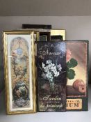 A box of pictures and wooden plaques