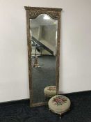 A gilt framed hall mirror and a stool