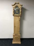 A Tempus Fugit oak cased clock with brass dial