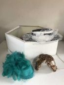 A box of assorted formal hats