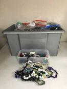 A box containing a large quantity of costume and fashion jewellery