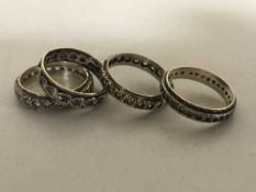 Four 9ct gold and silver rings