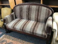 An antique mahogany framed settee