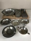 A tray of pewter pieces, bowls, plates, ash trays, money box,