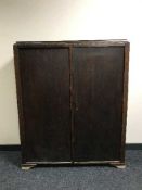 An oak double door cabinet
