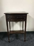 A mahogany bow-fronted side table