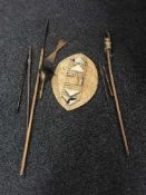 A collection tribal items : zulu type hide shield, spear, spear heads,