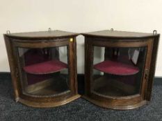 A pair of oak wall mounted glazed,