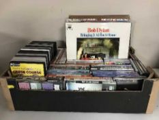 A box of LP records and DVDs - Bob Dylan,