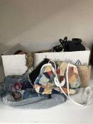Three boxes of assorted lady's hand bags