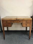 A Georgian mahogany gentleman's folding dressing table