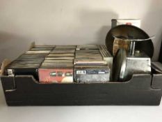 A box of Cds, camera accessories, scales & weights,