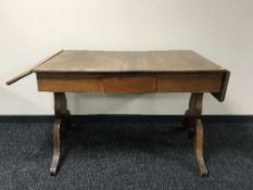 A late 19th century drop leaf sofa table