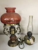 A brass oil lamp,