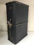 A metal bound luggage case