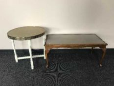 A walnut table and a painted brass topped table